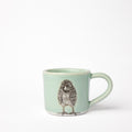 Petite tasse en forme de poussin céladon